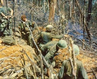 Paratroopers of the 4th Battalion, 173rd Airborne prepare defensive positions against a possible NVA counter-attack on Hill 875 near Dak To (Central Highlands).