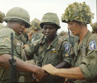 Members of Company B, 2nd Battalion, 173rd Airborne prepare for the first major ground combat operation by U.