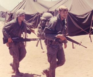 Riflemen with the 3rd Platoon, Co 'D', 3rd Bn.