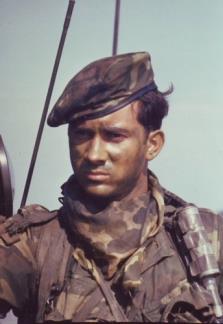 Hospital Corpsman 2nd Class Clarke Long wears camouflage grease paint during a SEAL Team One operation south of Saigon.