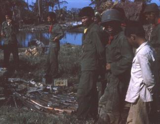 ARVN Rangers show off a haul of VC weapons captured during an operation near Soc Trang in the Mekong Delta.