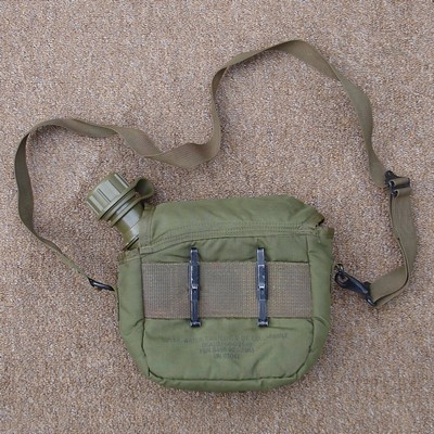 2nd pattern 2 quart canteen cover with a non-detachable strap and slide keepers.