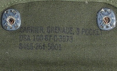 The Nomenclature, FSN and contract details were stamped inside the flap of grenade carrier's top pouch.