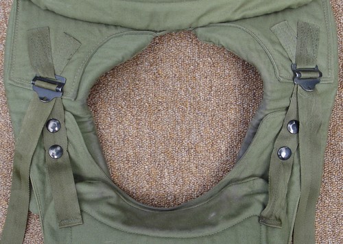 The Army Concept Team in Vietnam recommended that quick-release snap fasteners with non-slip buckles be added to both shoulders in February 1968.