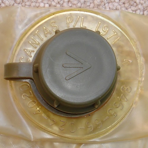 Australian 2-quart bladder cap with broad arrow stamp.