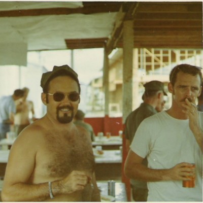 Seawolf door gunner Bill Rutledge, on the left, in Binh Thuy in April 1970.