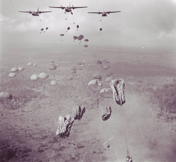 Vietnamese paratroopers jump from USAF C-123 transports during Operation Phi Hoa II, a tactical air-ground envelopment strike against Viet Cong in the Tay Ninh Province of South Vietnam.