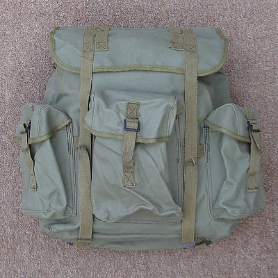 The CISO made CIDG Rucksack had three outside pockets, each of which had adjustable strap and buckle closures.