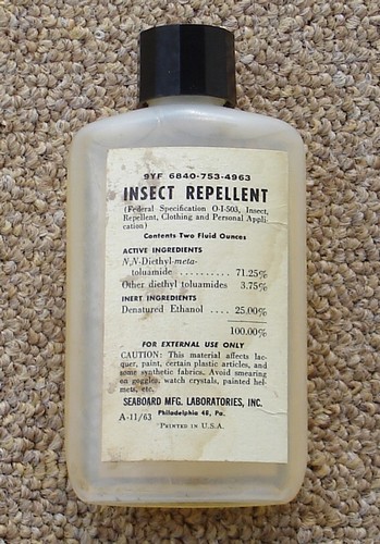 1963 dated 2oz bottle of insect repellent with a paper label.
