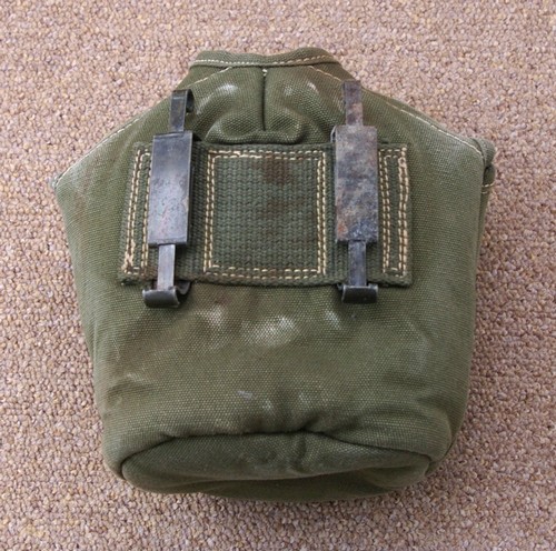 The experimental EX-54 webbing introduced the slide keeper attachment method that was used on the production M1956 field gear.