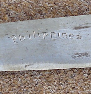 'Philippines' is inscribed on the bolo blade.