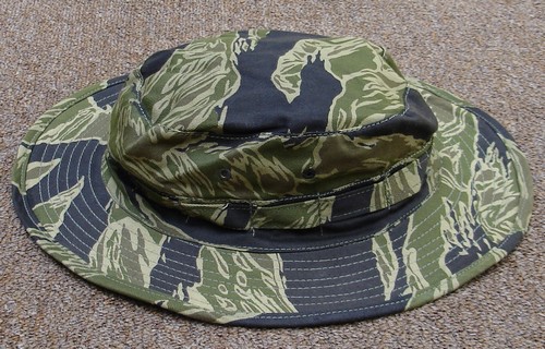 The JWD tiger stripe boonie had much smaller ventilation eyelets than the US issue OG-107 or ERDL jungle hats.