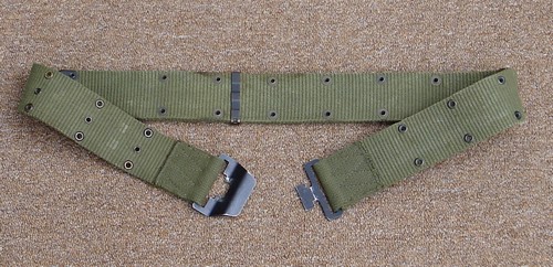 The P64 Lightweight Rucksack was issued with a waist belt, which often used by Special Forces in Vietnam as an equipment / pistol belt.