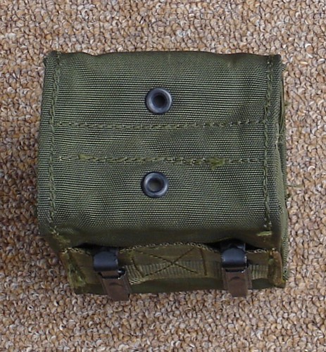 Both magazine compartments of the nylon XM1964 M-14V pouch had a drain hole.