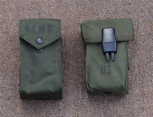 The USMC M1967 M14 ammunition pocket (right) was developed after testing of the experimental XM1964 nylon M-14V pouch (left).
