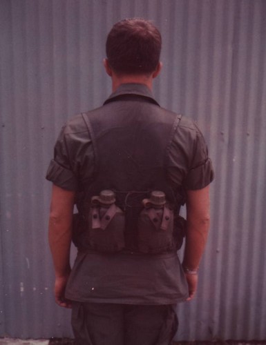 The lower back portion of the vest boasted two pockets far carrying 1-quart canteens.