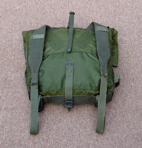 The nylon USMC M1941 Haversack had two shoulder straps and belt supporting strap at the bottom.