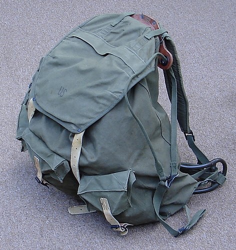 The rifle securing strap on the M1952 Mountain Rucksack was laced through a grommet in the leather frame pocket.