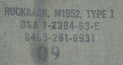 Nomenclature and contract stamp inside the top flap of the M1952 Rucksack.
