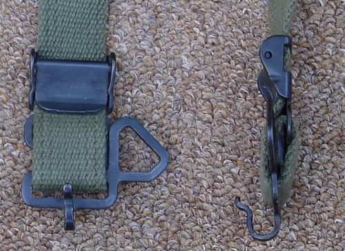The 2nd pattern M1956 suspenders featured front hook sleeping gear attachment loops that were fabricated from flattened rather than rounded metal