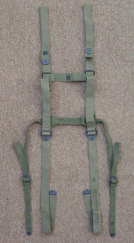 Cotton sleeping bag carrier strap assembly.