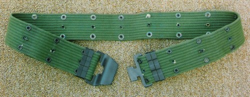 M1956 pistol belt with the quick release T-slot fastener designed by Davis Aircraft Products, Inc.