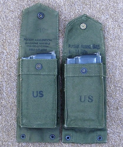A comparison between a 1967 dated 'long' pouch and an early war 'short' version.