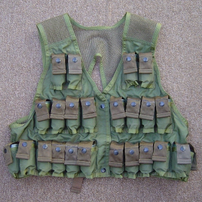 The 1967 designed M79 Grenade Vest had a capacity of 24 rounds - all on the front.