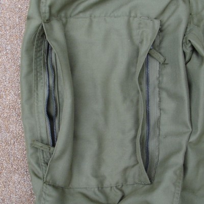 The thigh pockets of the Nomex Trousers had zip closures towards the inside leg.