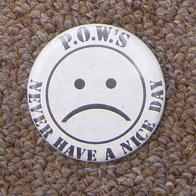 POWs Never Have A Nice Day badge.