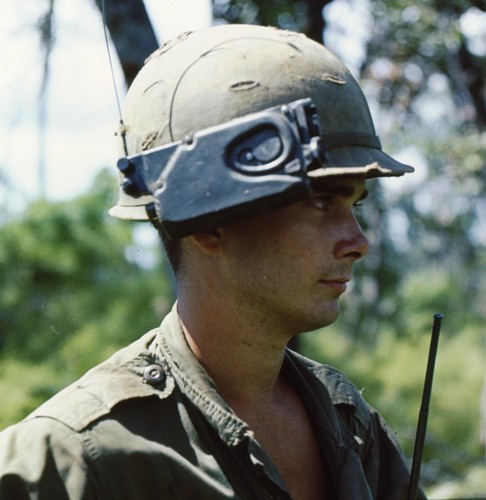 A member of the 22nd Infantry, 4th Infantry Division wears the PRR-9 Helmet mounted receiver.