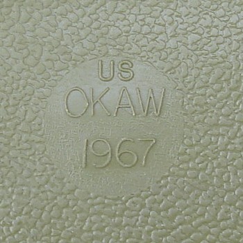 Manufacturers name and date stamp on the plastic machete sheath.