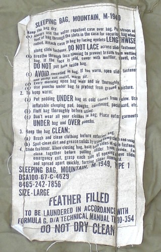 The label in the M1949 Mountain Sleeping Bag provided instructions on how to keep warm as well as how to keep the bag dry and clean.