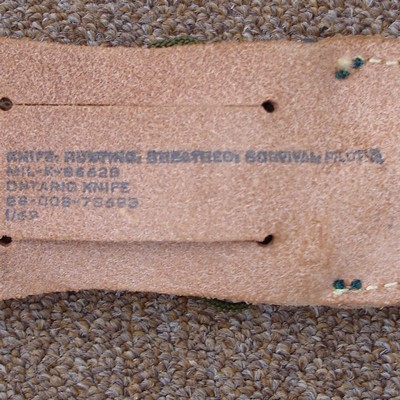 Stamp on the back of the pilot's survival knife sheath.
