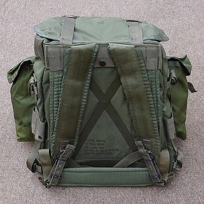 The rucksack's metal frame can been seen between the two shoulder straps.