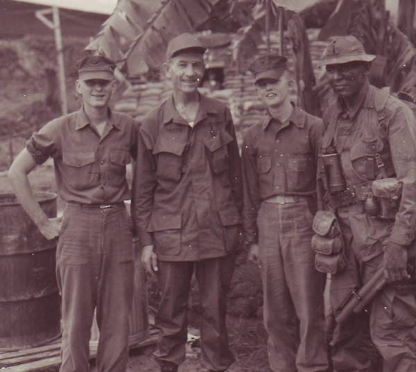 Three Marines from the 1st Reconnaissance Battalion spend time with Congressman Pettis of California during his visit to Vietnam.