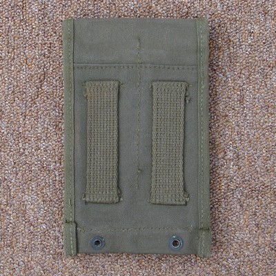 The 30rd Carbine Pouch attached to the pistol belt via its' two belt loops.