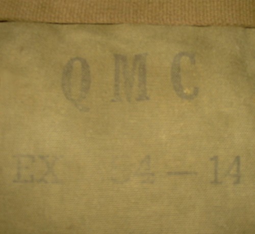 The Quartermaster stamp on the compartment flap of the EX 54-14 Combat Pack.
