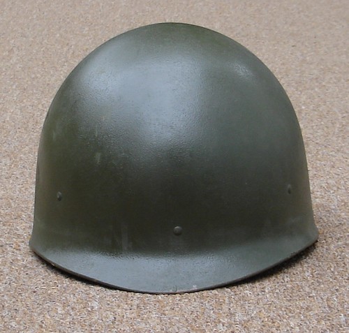 The P64 Infantry Helmet Liner was made from laminated cotton duck between 1964 and 1969.