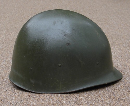 Side view of the P64 Infantry M1 Helmet Liner.