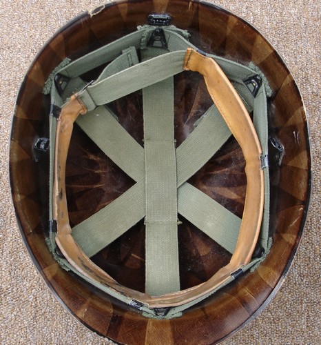 The P64 Infantry and Parachutist M1 Helmet Liners boasted a new suspension system that featured three webbing straps that could each be adjusted to hold the liner at the right height on the head.