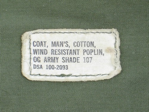 The 2nd pattern variant Tropical Combat Jacket identification label displayed the nomenclature and contract number.