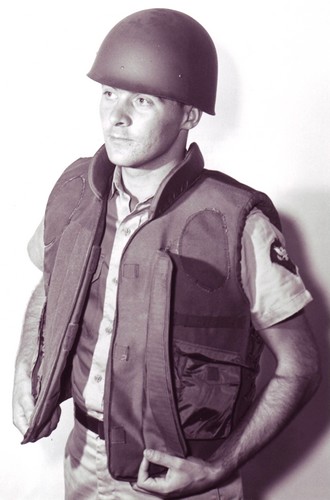 The experimental T66-2 Lightweight Felt Fragmentation Protective Vest weighed 5lbs and featured a front Velcro fastener, two cargo pockets and adjustable elastic draw cords on each side.