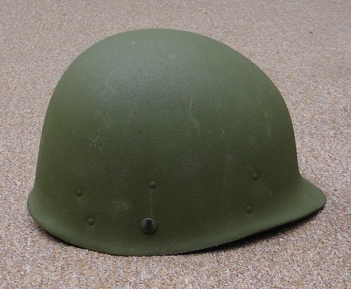 Side view of the P64 Parachutist's M1 Helmet Liner.