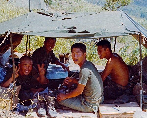 Troops of the 2nd Company, 1st Battalion, Cavalry Regiment, ROK Tiger Division, relax during Operation Surprise in the Central Highlands, 5 miles south of An Khe Pass.