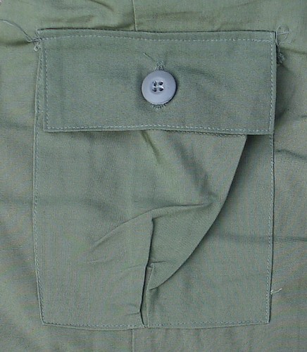 The left thigh cargo pocket on  all Tropical Combat Trousers contained a smaller inner pocket that was originally designed to hold a survival kit.