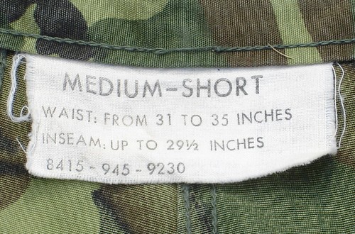 4th pattern Tropical Combat Trousers size label with waist size, inseam and FSN number.
